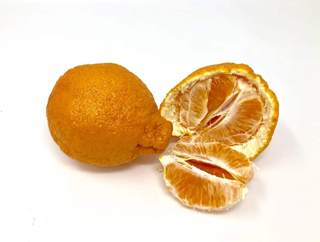 2 sumo citrus - 1 half peeled open