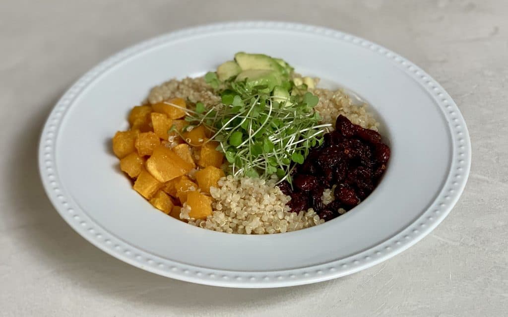 Side view of roasted butternut squash and quinoa salad