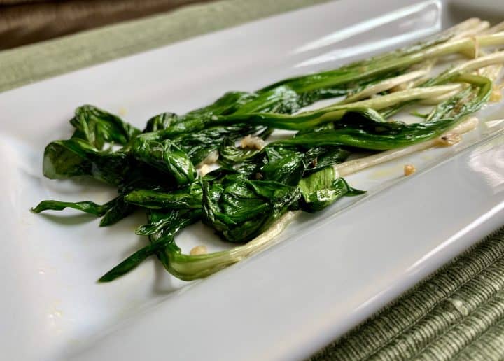 Sautéed Ramps on white platter