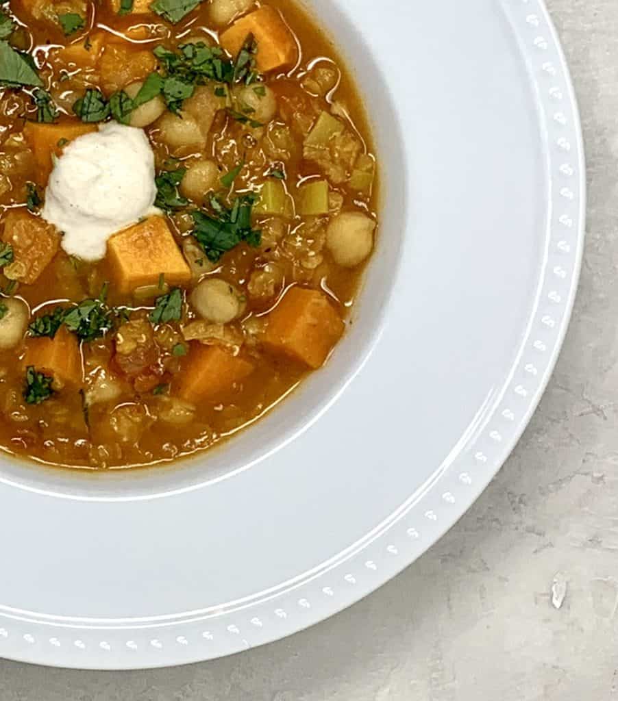 Sweet Potato, Chickpea and Red Lentil Soup is a hearty vegan soup topped with Cashew Cream